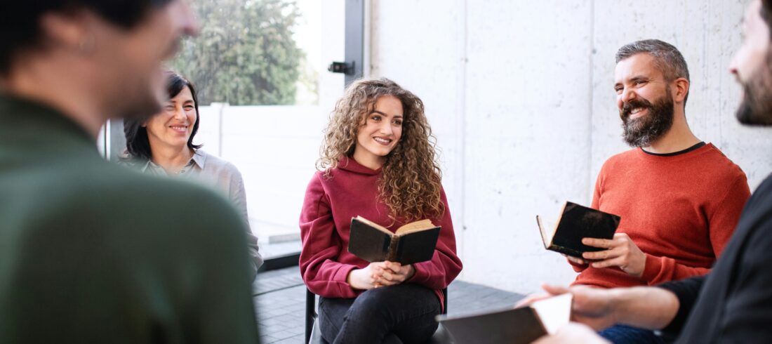 Business team meeting demonstrating faith-based leadership, collaboration, and integrity in the workplace